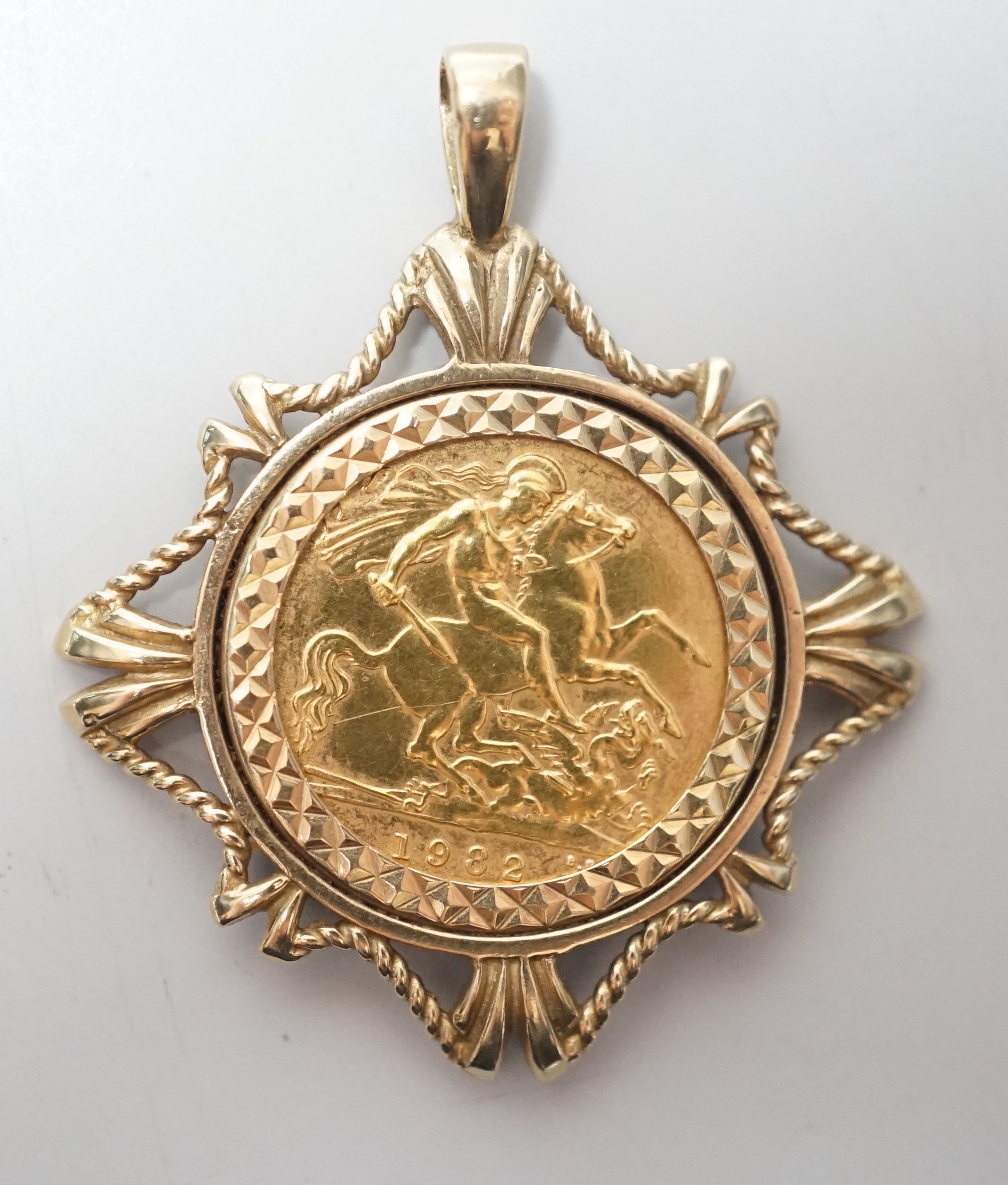 An Elizabeth II 1982 gold half sovereign, in 9ct gold pendant mount, 7.7 grams.